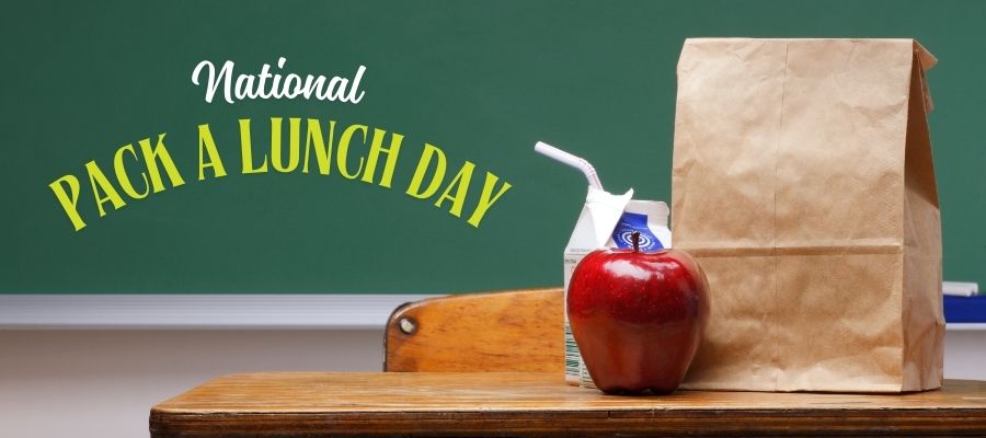 Photo of a paper lunch bag sitting on a desk.